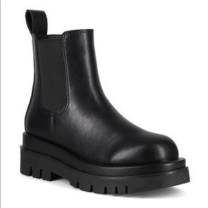 Weatherproof black lug sole ankle boots
